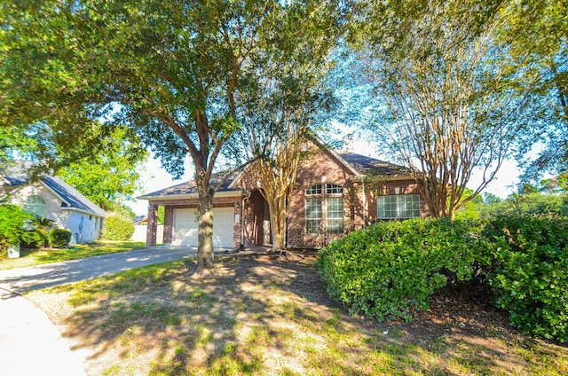 ranch-style home with a garage