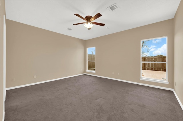 carpeted empty room with ceiling fan