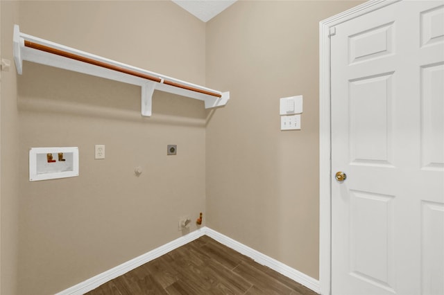 laundry room with washer hookup, hookup for a gas dryer, electric dryer hookup, and dark wood-type flooring