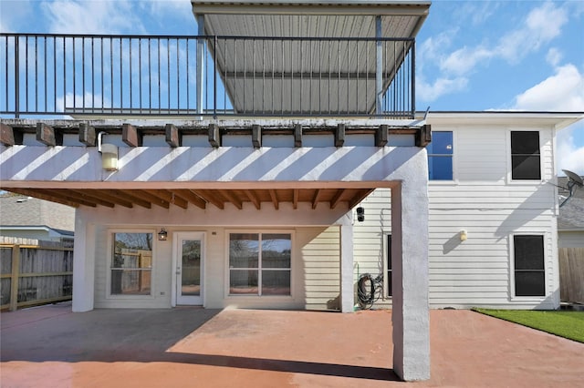 back of house featuring a patio area