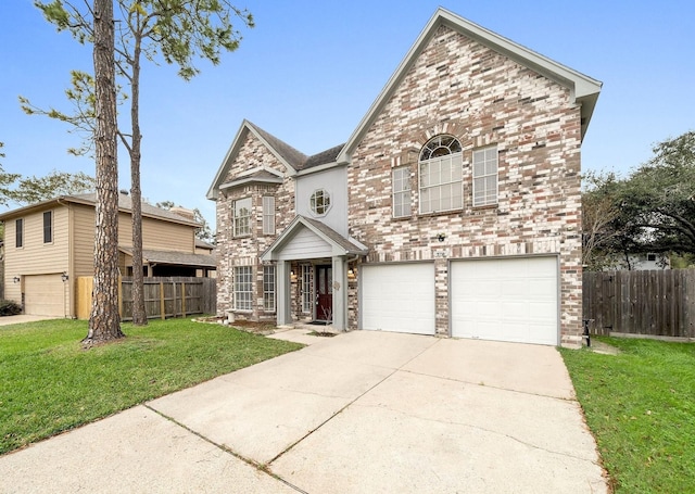 view of front property with a front yard and a garage