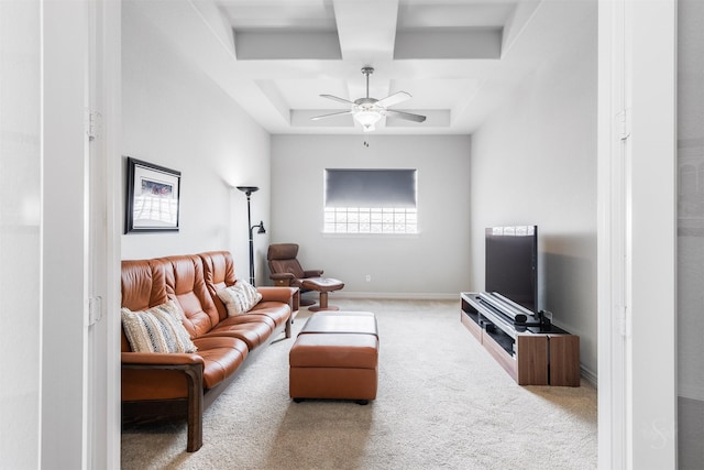 carpeted living room featuring ceiling fan