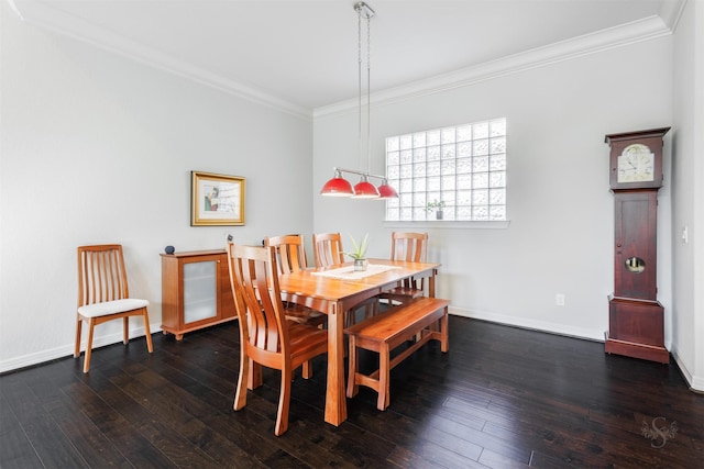 dining space featuring ornamental molding and dark wood-type flooring