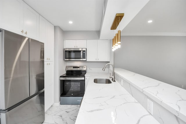 kitchen with sink, decorative light fixtures, light stone counters, white cabinetry, and stainless steel appliances