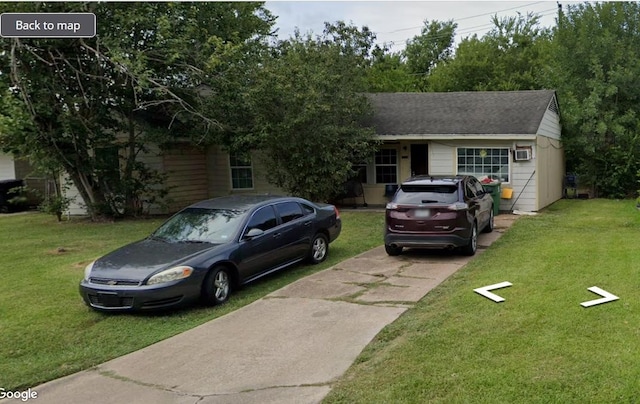 view of front of home with a front yard