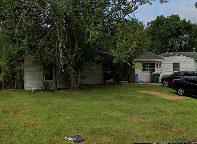 exterior space with a front lawn