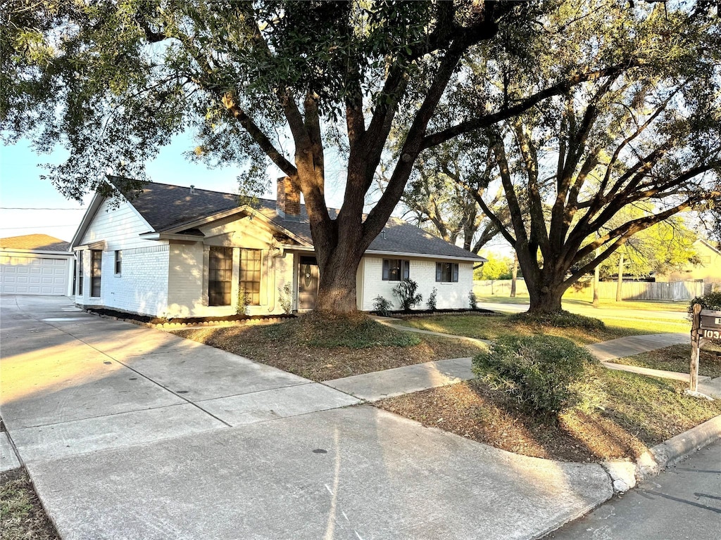 ranch-style house featuring a garage