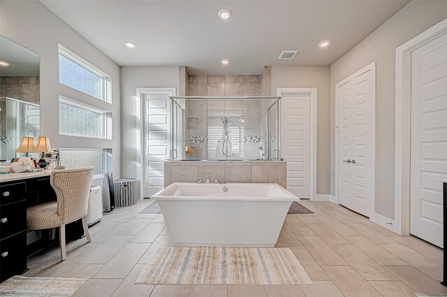 bathroom with plus walk in shower