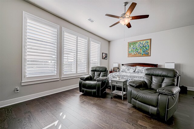 bedroom featuring dark hardwood / wood-style floors and ceiling fan