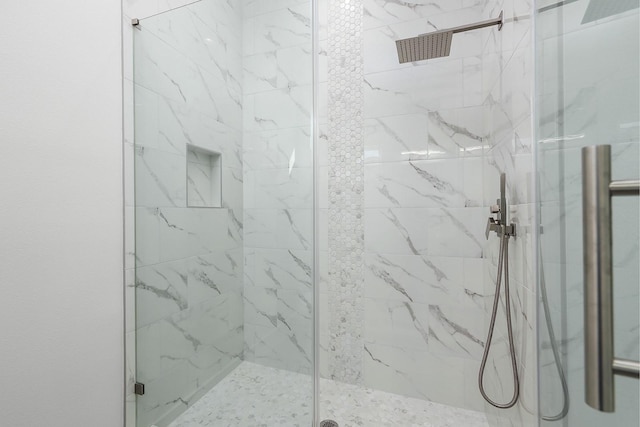 22803 Miramar Dr, Galveston, TX 77554 - bathroom featuring a marble finish shower
