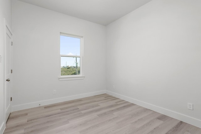 empty room with light wood-type flooring