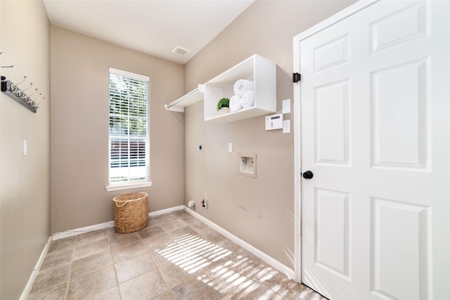 clothes washing area with electric dryer hookup, gas dryer hookup, hookup for a washing machine, and a healthy amount of sunlight