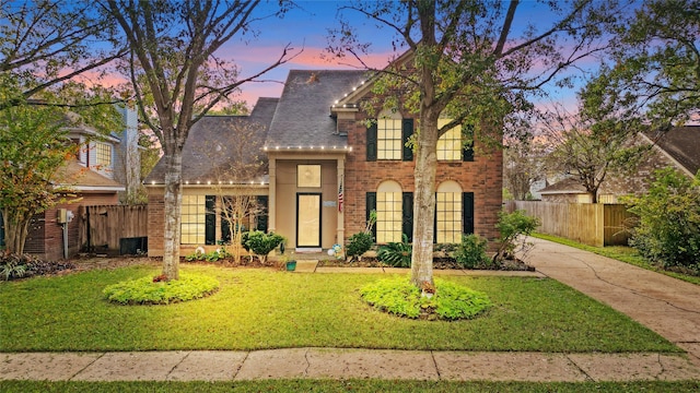 view of front property with a yard