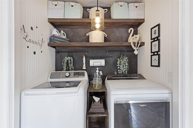 laundry room featuring washing machine and dryer