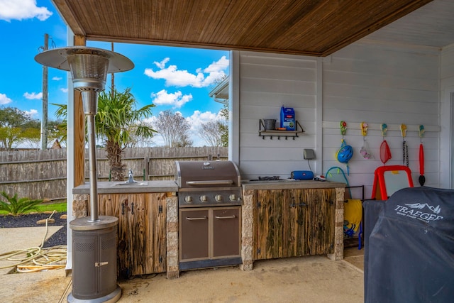 view of patio with grilling area and exterior kitchen