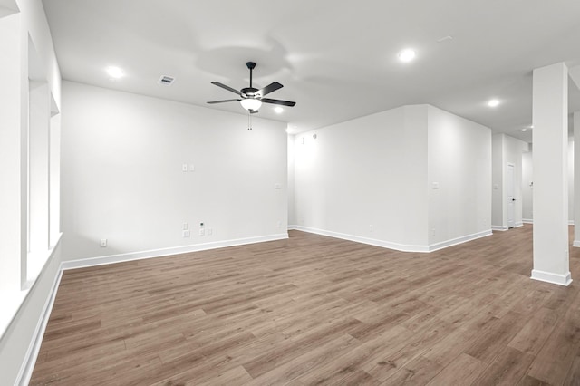 unfurnished room featuring ceiling fan and light hardwood / wood-style floors