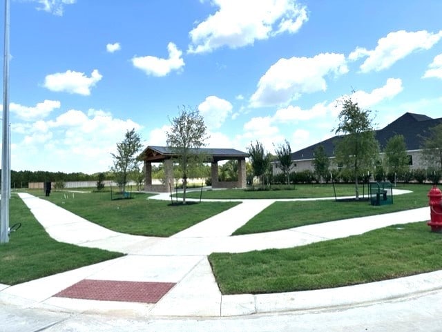 view of property's community featuring a gazebo and a yard