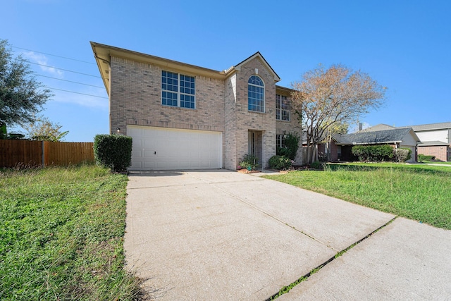 view of front of house with a garage and a front yard