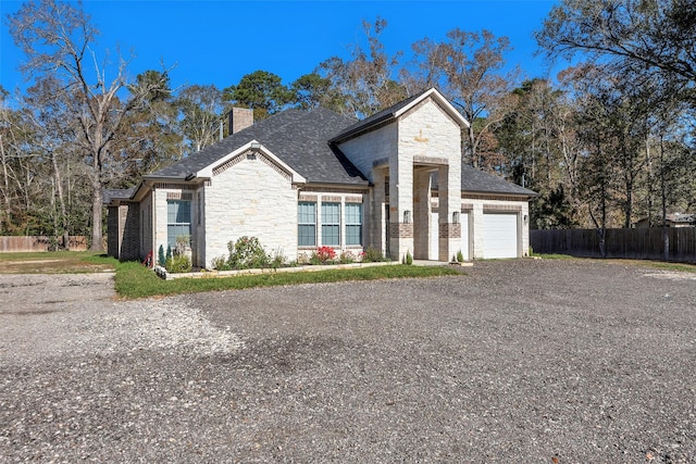 view of front of home featuring a garage