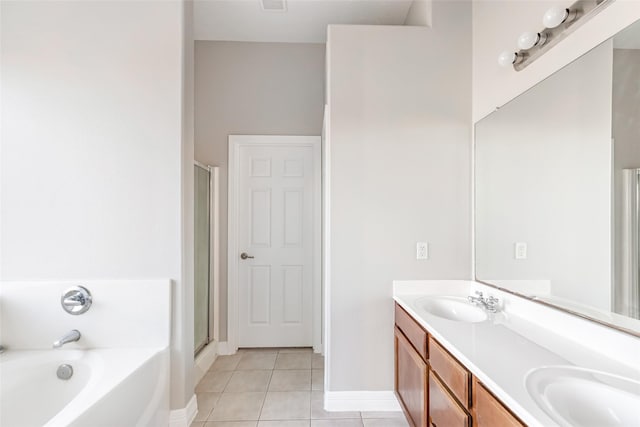 bathroom featuring separate shower and tub, tile patterned flooring, and vanity