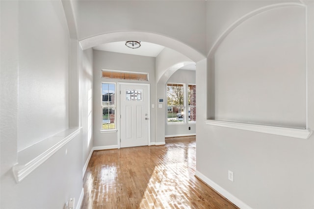 foyer entrance with light hardwood / wood-style floors