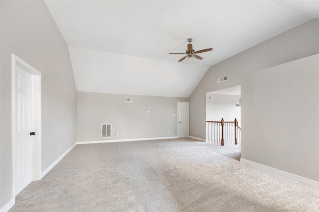 bonus room with ceiling fan, light colored carpet, and lofted ceiling