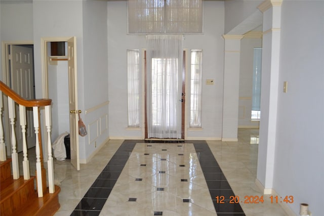 entryway with a wealth of natural light and french doors