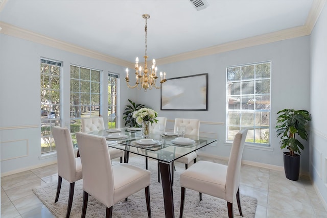 dining space with ornamental molding, visible vents, plenty of natural light, and a decorative wall