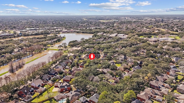 bird's eye view with a residential view and a water view