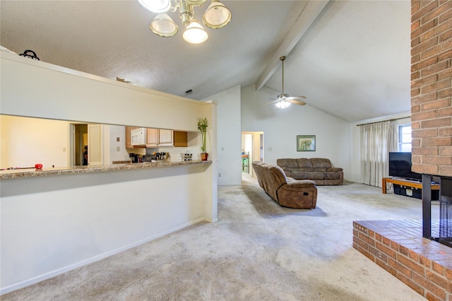 carpeted living room featuring ceiling fan and lofted ceiling with beams