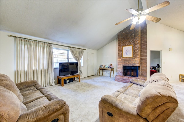 living room with a brick fireplace, a textured ceiling, light colored carpet, vaulted ceiling, and ceiling fan