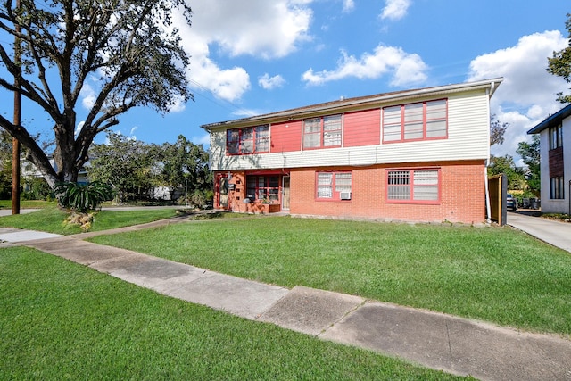 view of front of home with a front lawn