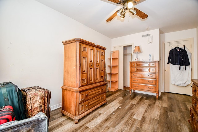 sitting room with dark hardwood / wood-style floors