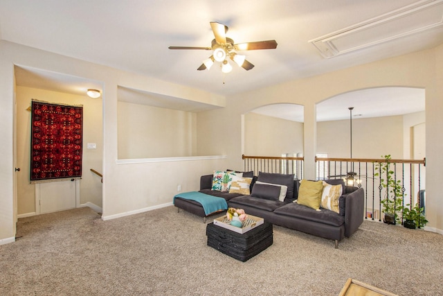 living room featuring ceiling fan and carpet floors