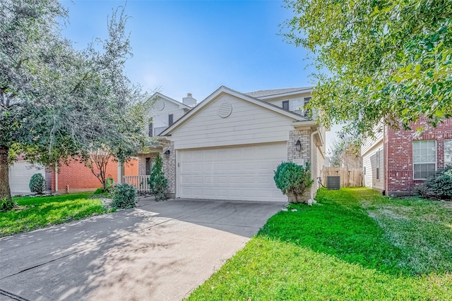 view of front of house featuring a front yard and a garage