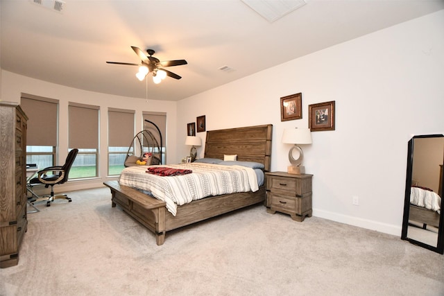 carpeted bedroom featuring access to exterior and ceiling fan