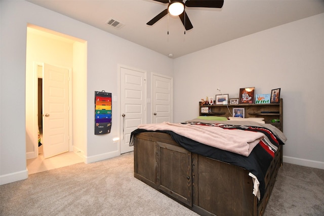 carpeted bedroom featuring ceiling fan