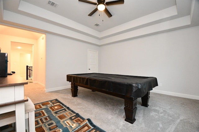 game room with ceiling fan, light carpet, billiards, and a tray ceiling