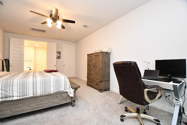 bedroom with light colored carpet, ceiling fan, and lofted ceiling