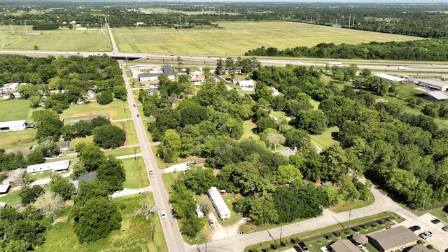 birds eye view of property featuring a rural view