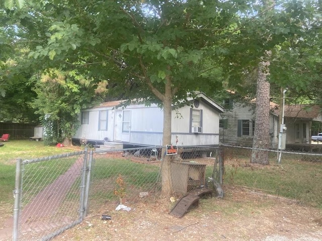 view of front of home featuring cooling unit