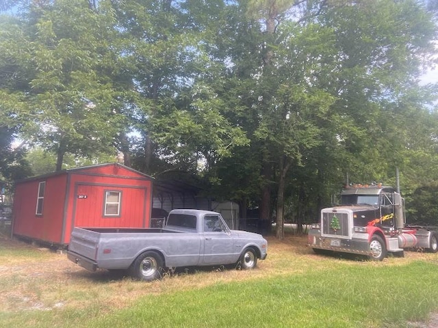 view of yard with a carport