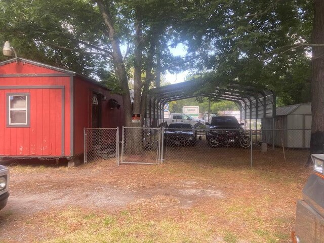 view of yard with a carport