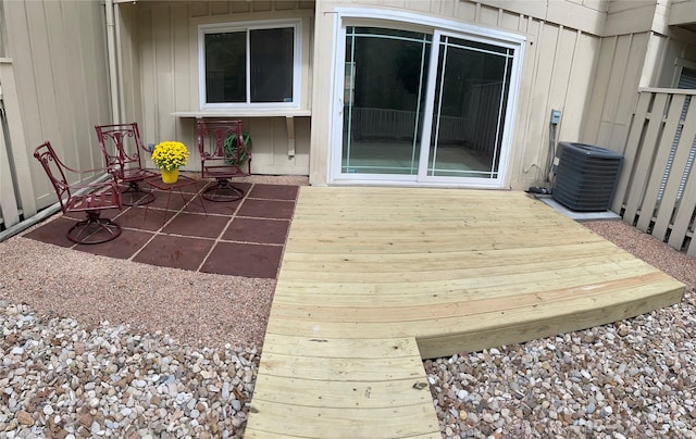 wooden terrace with central air condition unit