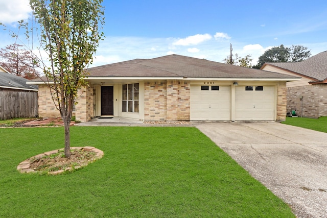 ranch-style house with a garage and a front yard