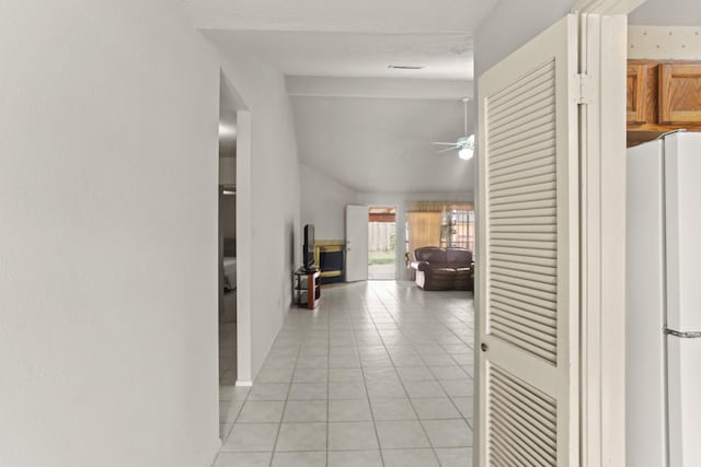 corridor featuring light tile patterned floors