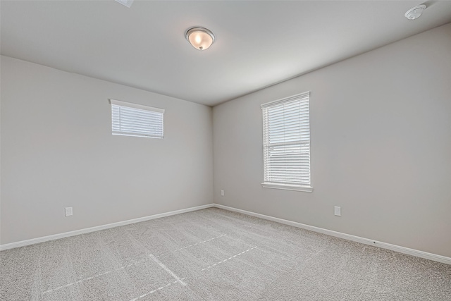 view of carpeted spare room