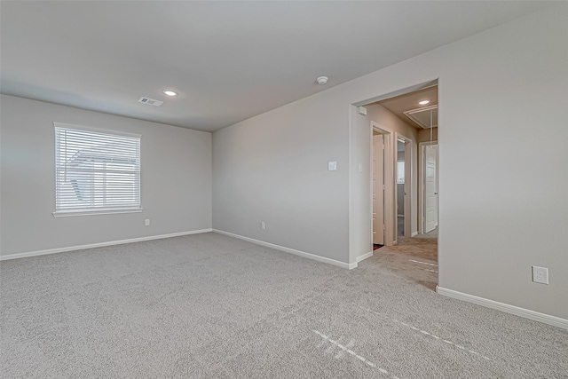 view of carpeted spare room