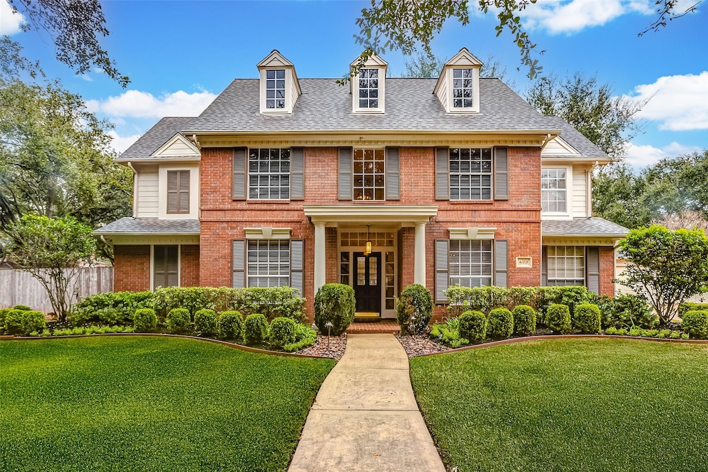 view of front of home with a front yard