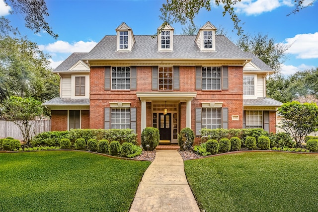 view of front of home with a front yard